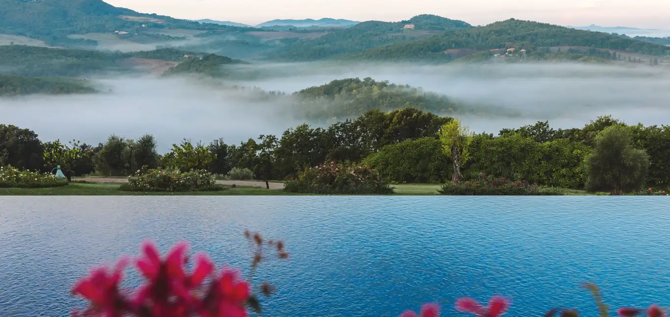 Castello di Casole, A Belmond Hotel, Tuscany : Swimming Pool and View 