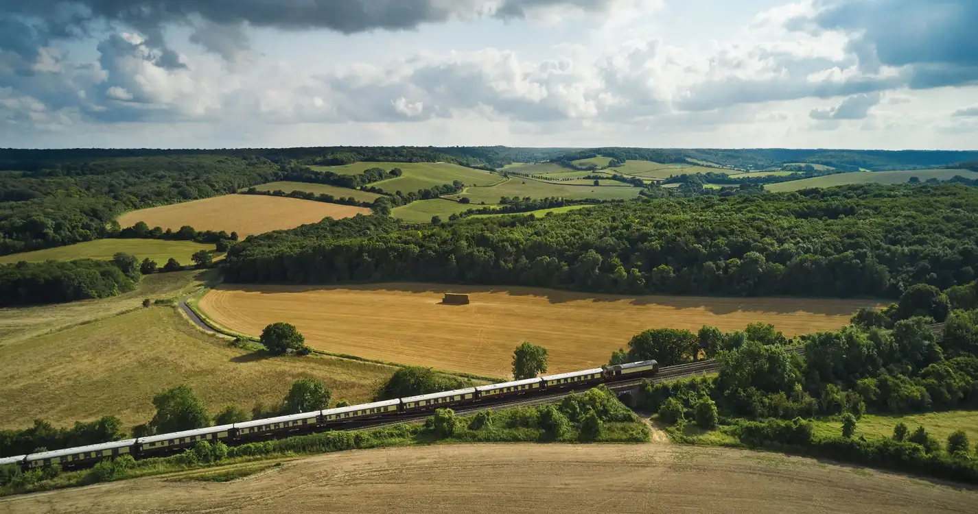 British Pullman, A Belmond Train, England : View of Train in the Countryside 